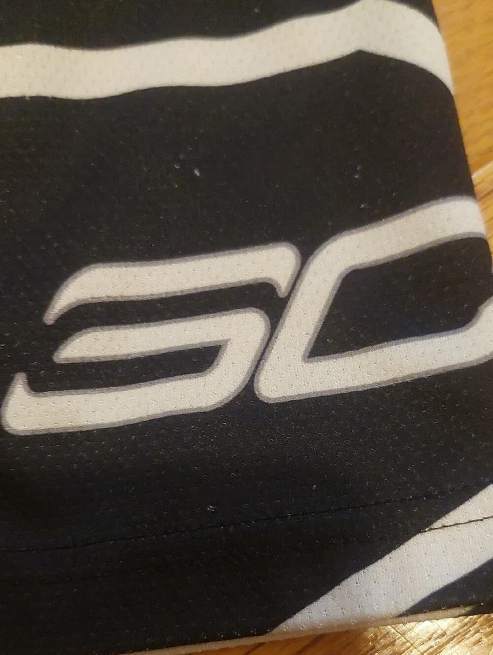 Under Armour Black Athletic Shorts with White Accents